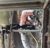 Ekso ZeroG Scaffold Chipping tool holder mount to scaffold overhead chipping overhead demolition rivet buster chipping hammer ergonomic demolition worker pneumatic tool holder CP air tools rivet busters Cp Tool repair bridge rehab