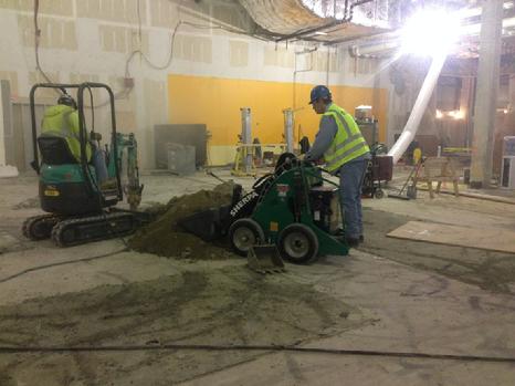 electric mini excavator working with electric skidsteer Sherpa Electric Mini Loader