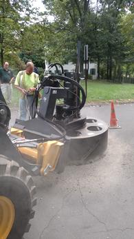 The HS-57 drastically reduces the hours required to repair manhole covers to minutes.